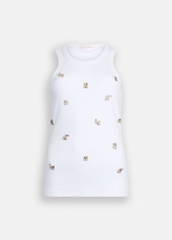 Top con applicazioni gioiello