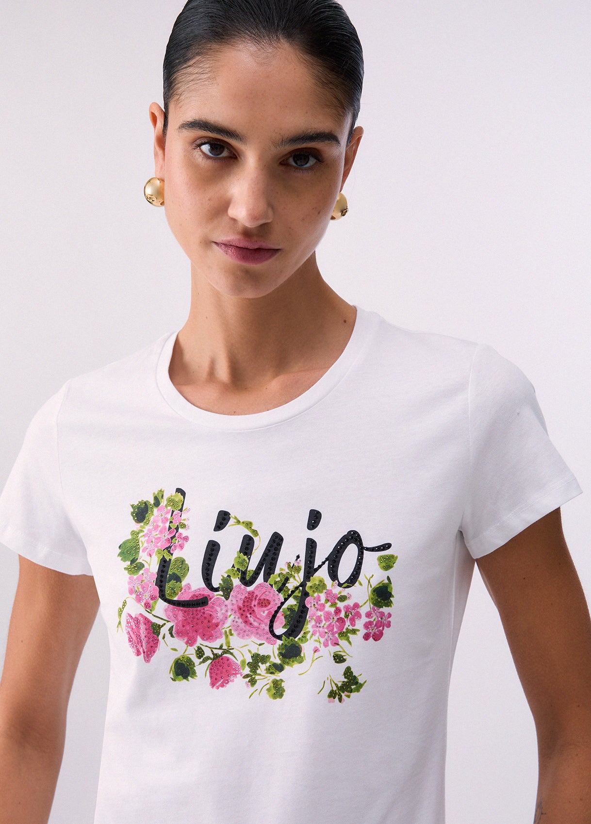 T-shirt con stampa e strass