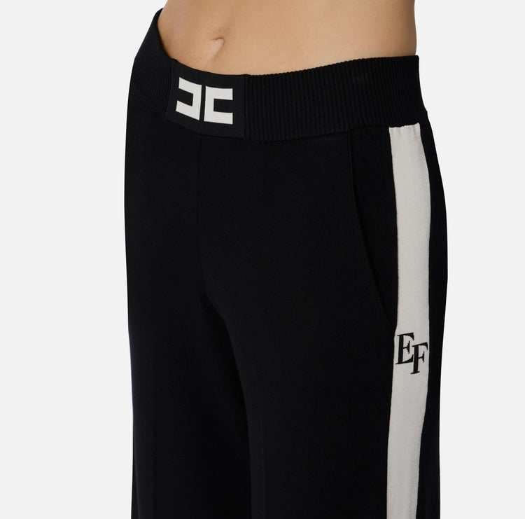 Pantaloni in viscosa con bande lucide
