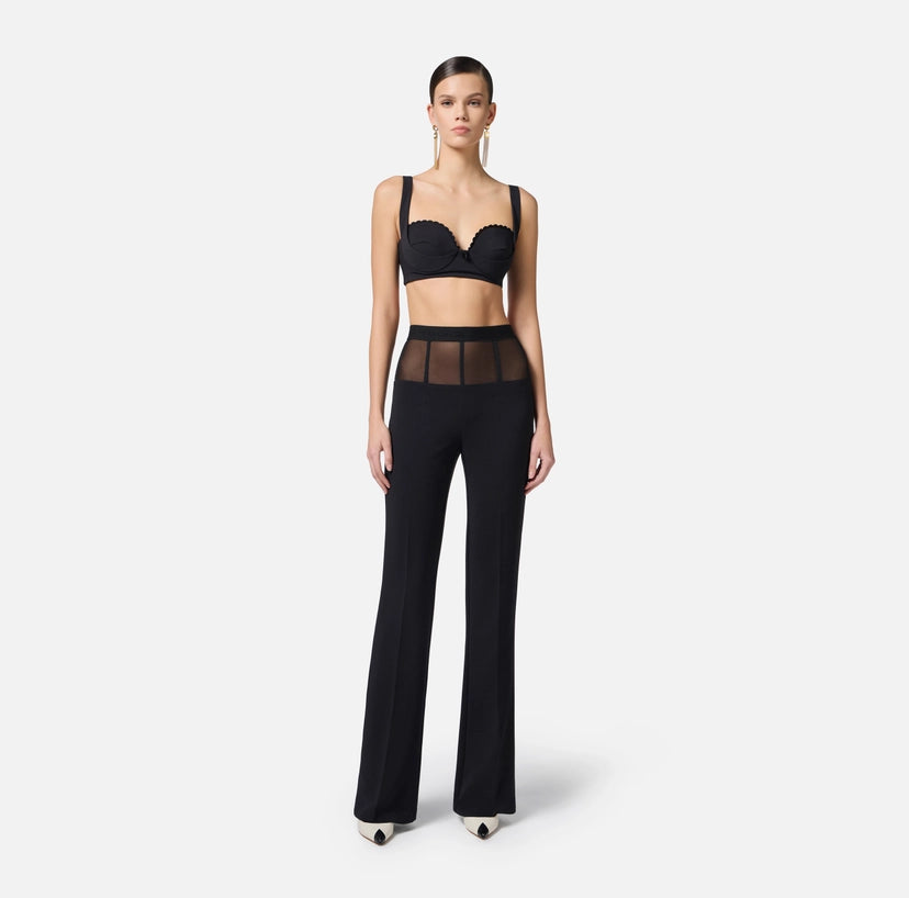 Pantaloni in crêpe con baschina in tulle