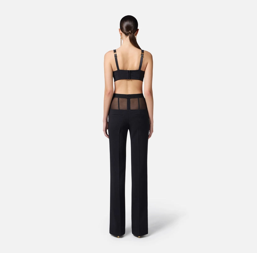 Pantaloni in crêpe con baschina in tulle