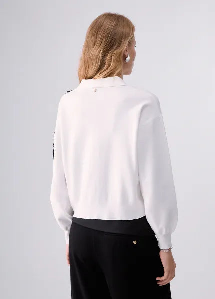 MAGLIA CON APPLICAZIONI