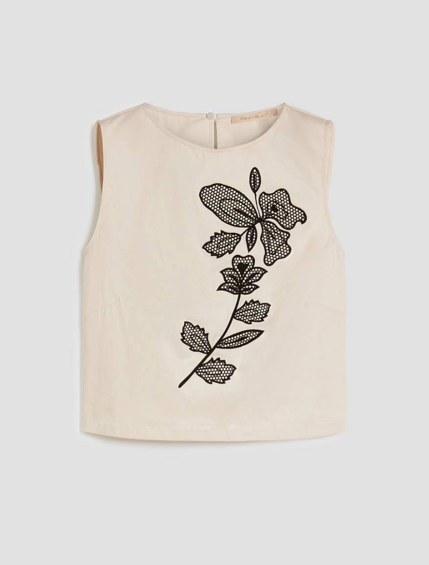 Top in cotone con ricamo
