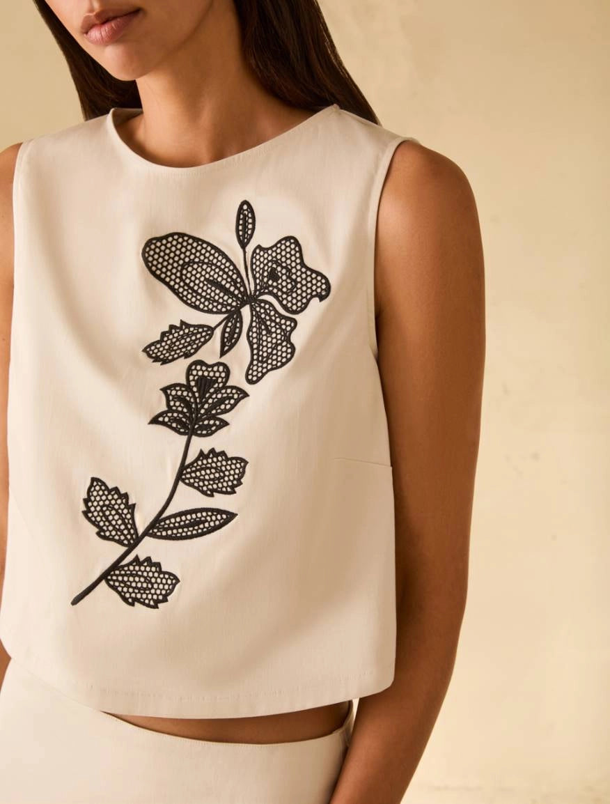 Top in cotone con ricamo