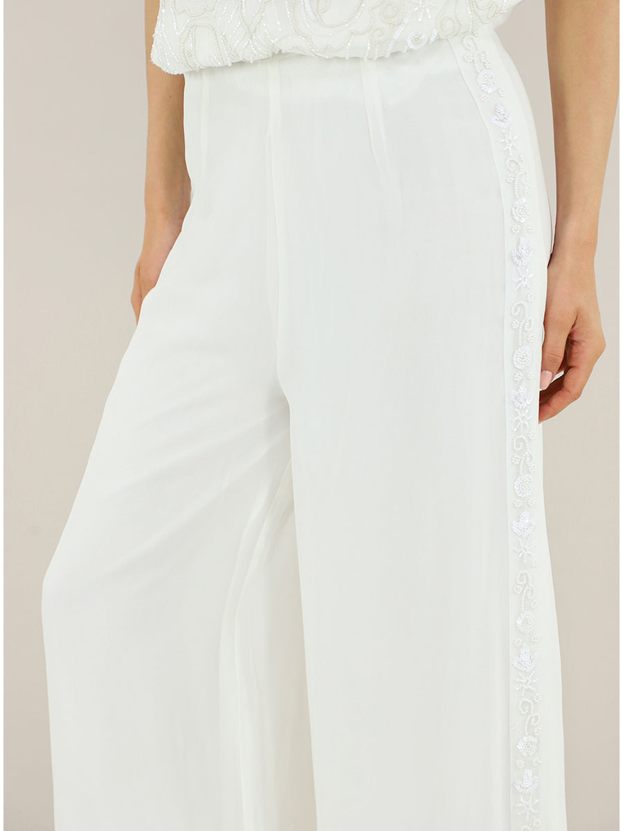 Pantalone con applicazioni