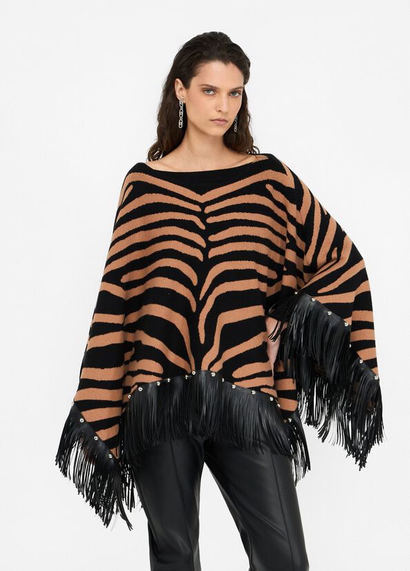 Poncho zebrato con frange