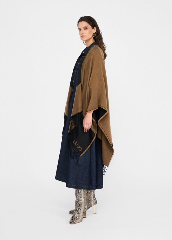 Poncho con logo e frange