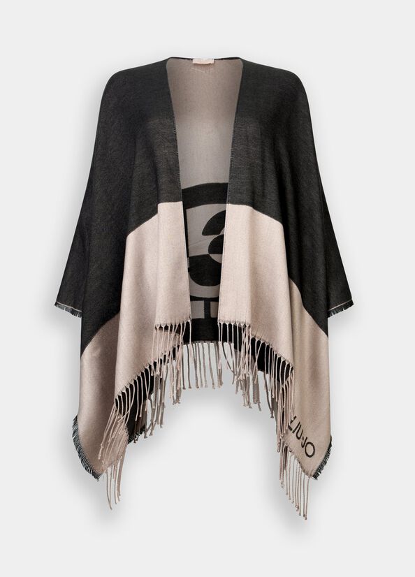 Poncho con logo e frange