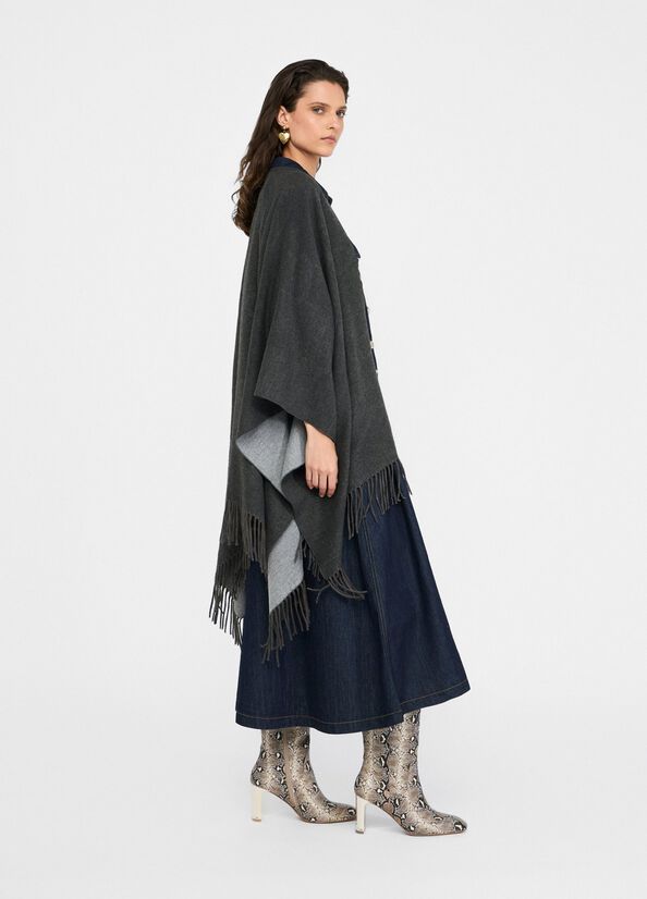 Poncho con logo e frange