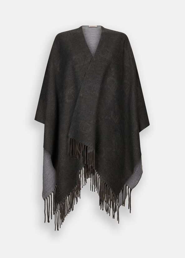 Poncho con logo e frange