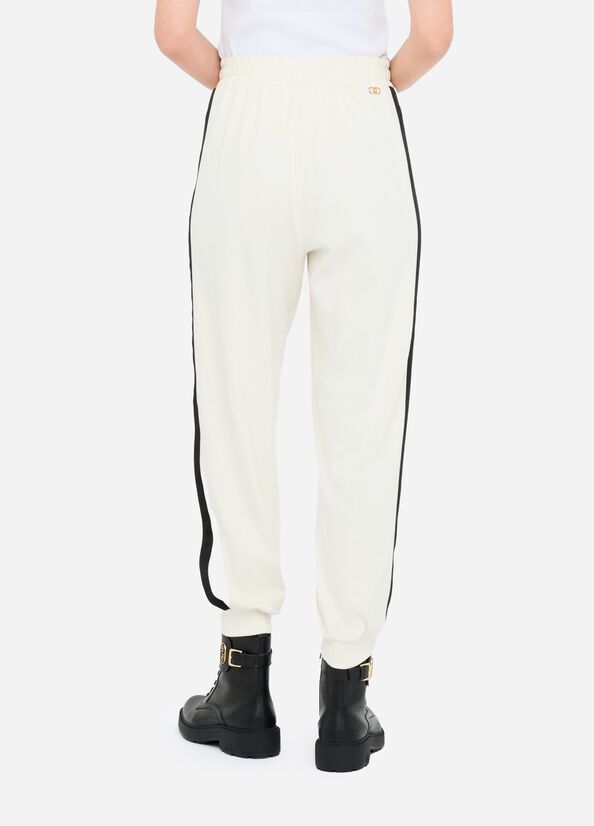 Pantaloni jogging in felpa con pizzo