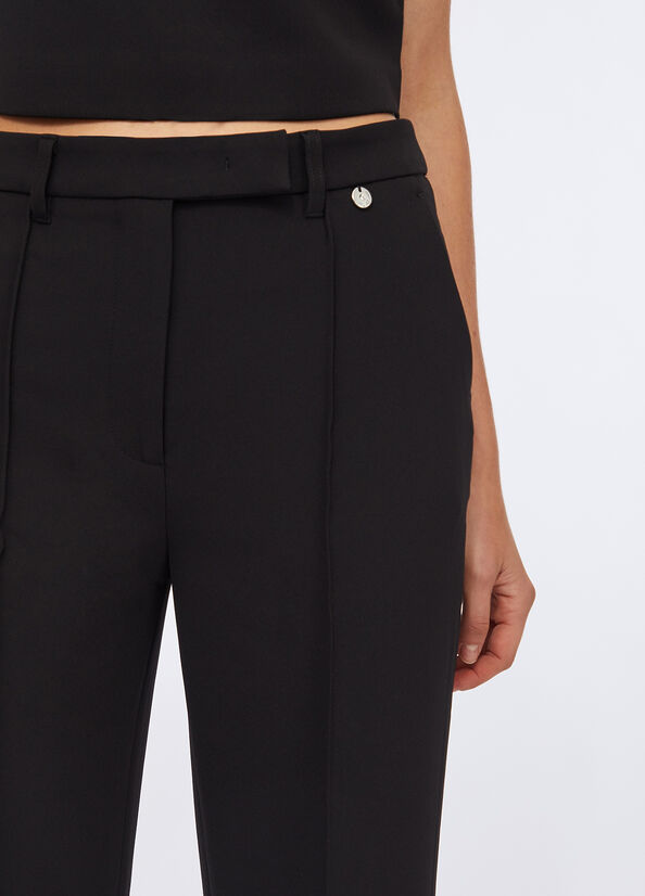 Pantaloni flare in cady