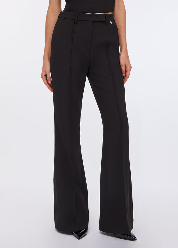 Pantaloni flare in cady