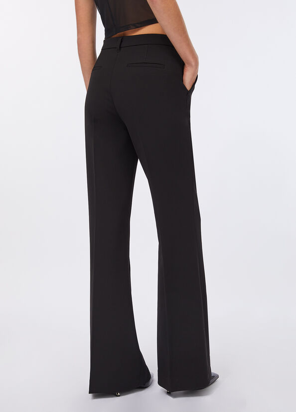 Pantaloni flare in cady