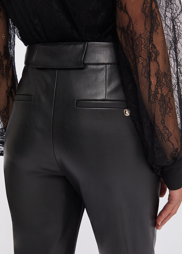 Pantaloni flare in tessuto spalmato