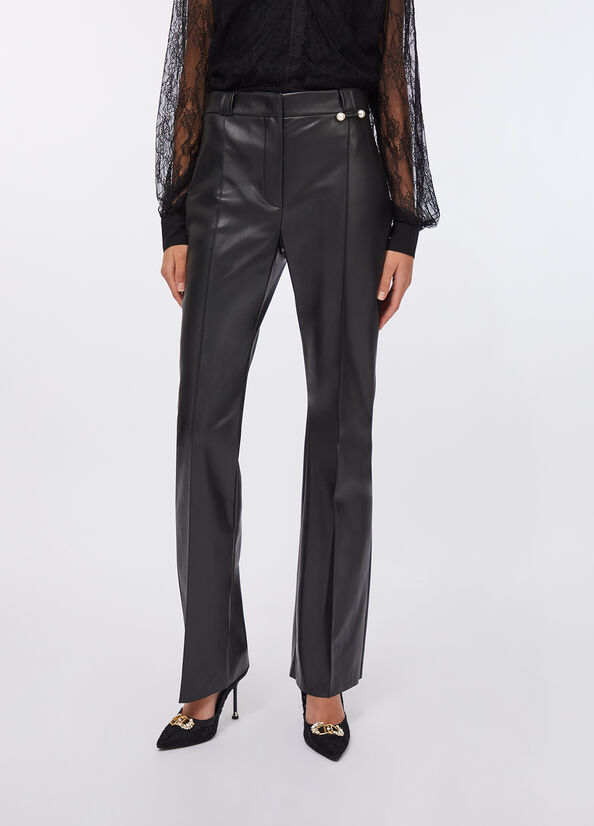 Pantaloni flare in tessuto spalmato