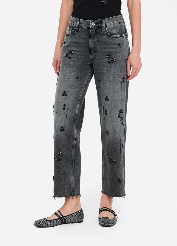 Jeans straight con strass