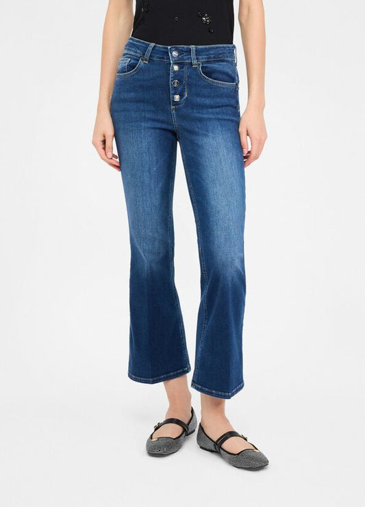 Jeans flare con bottoni gioiello