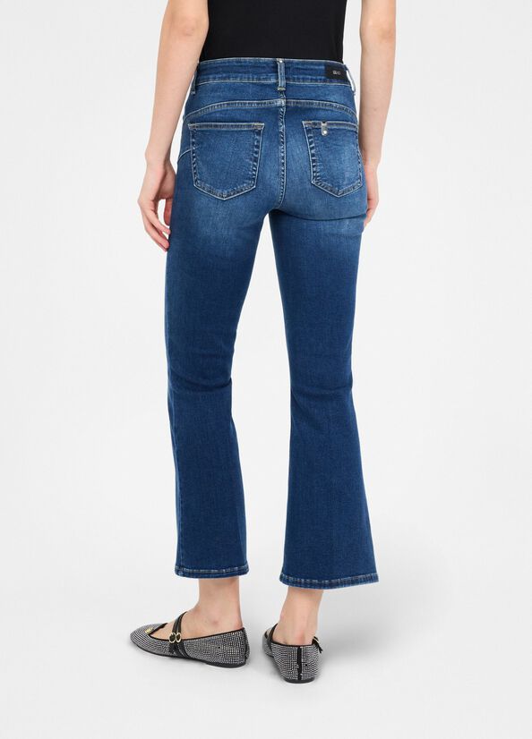Jeans flare con bottoni gioiello