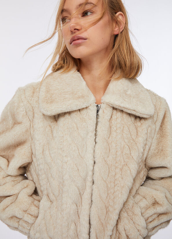 Bomber in teddy con trecce