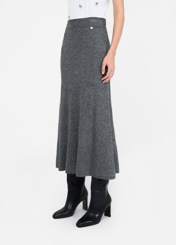 Gonna midi in maglia con paillettes