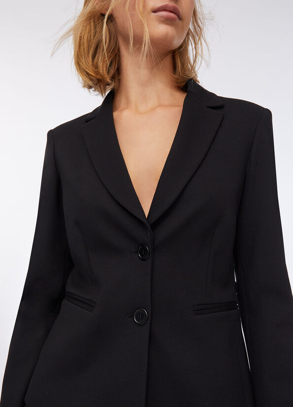 Giacca con cintura logata