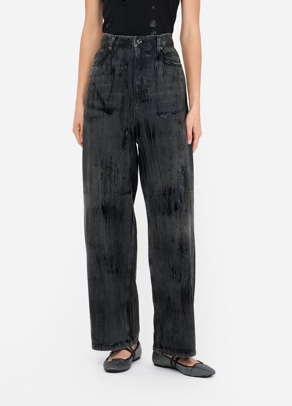 Jeans flare con spalmature