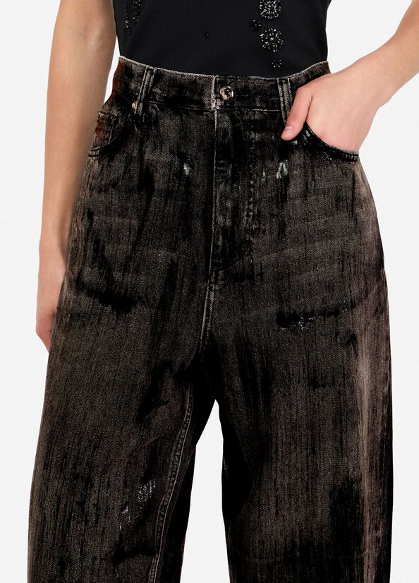 Jeans flare con spalmature