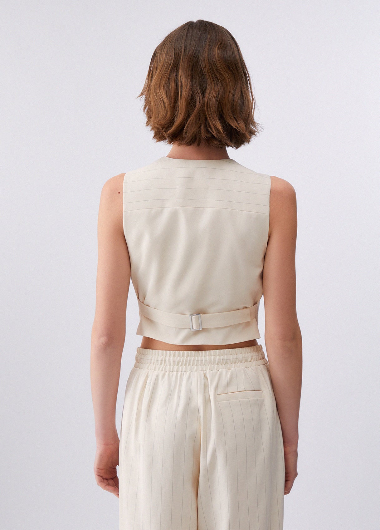 Gilet gessato con ricamo gioiello