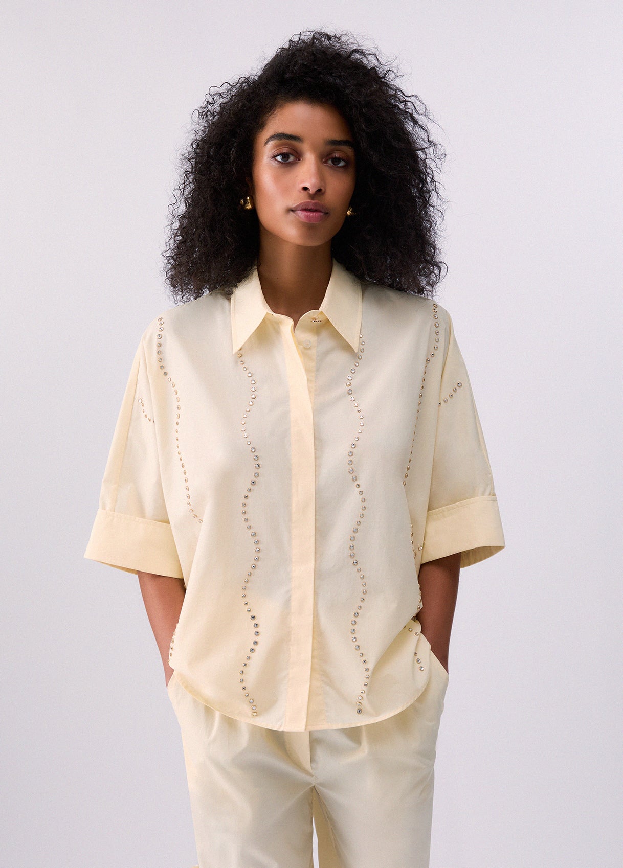 Camicia con applicazioni gioiello