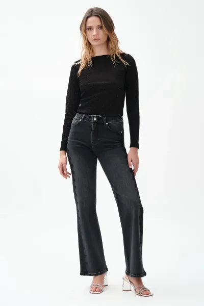 JEANS FLARE CON PIZZO