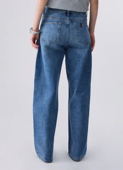 JEANS CON CINTONE ASIMMETRICO