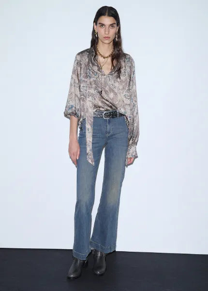 JEANS FLARE CON BOTTONI