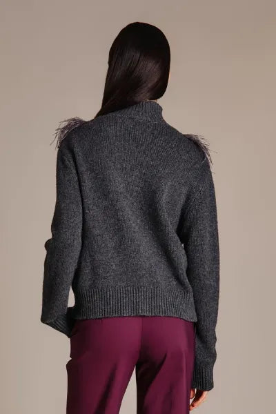 MAGLIA CON PIUME