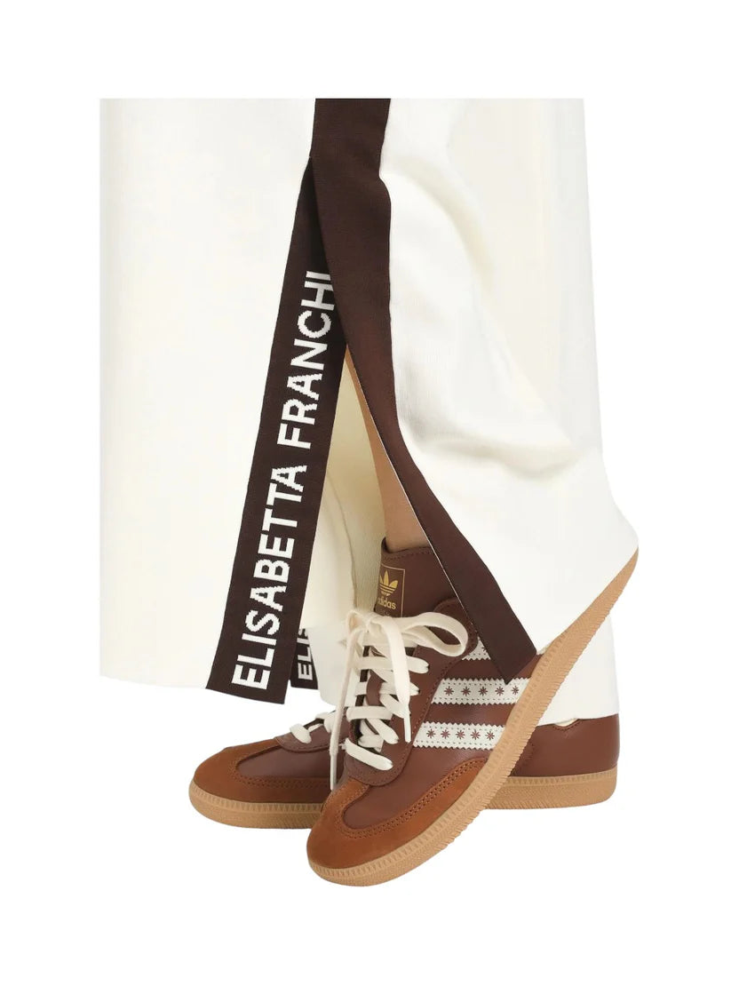 Pantaloni in viscosa con bande lucide